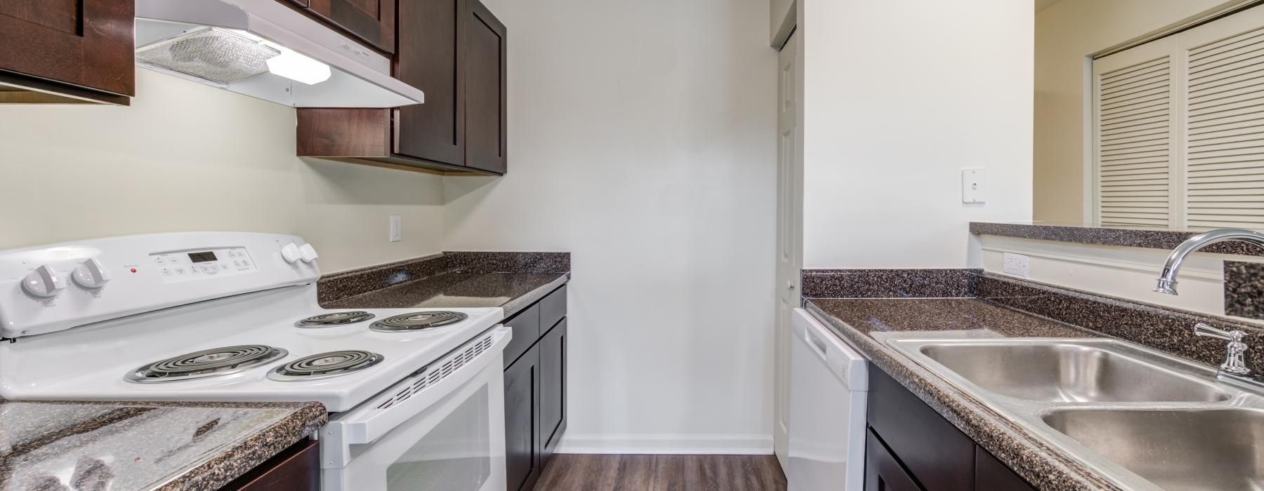 a kitchen with white appliances